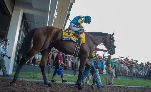 An impressive workout convinces American Pharoah's handlers to race the Triple Crown winner at the Travers Stakes next weekend