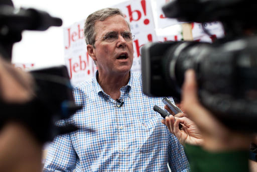 Republican Presidential candidate Jeb Bush speaks to the press at the 4th of July Parade in Merrimack N.H