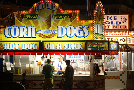 Fairgoers buy food at the Iowa State Fair