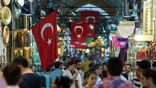 Turkey's lira drops to record low against dollar