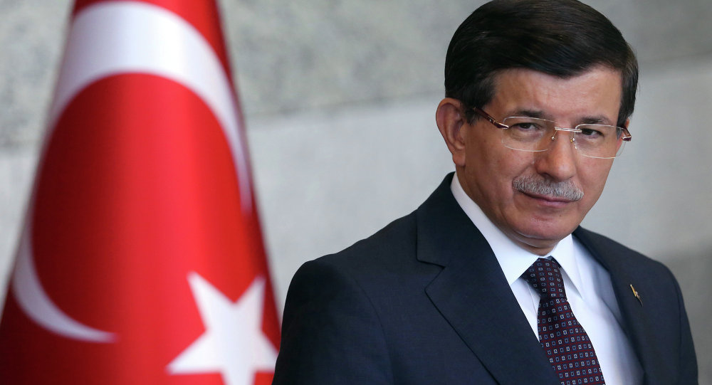 Turkish Prime Minister Ahmet Davutoglu pauses as he speaks to the media in Ankara Turkey