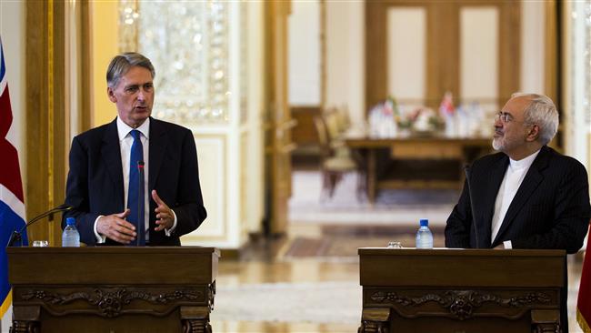 Iranian Foreign Minister Mohammad Javad Zarif and his British counterpart Philip Hammond give a joint press conference in Tehran