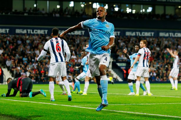 Vincent Kompany celebrates after scoring the third goal at The Hawthorns