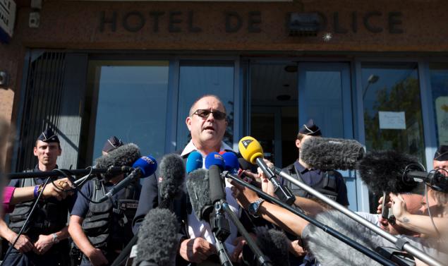 Chris Norman speaks with reporters after he helped three Americans thwart a gunman aboard a passenger train in France