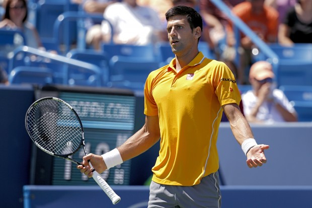 Novak Djokovic of Serbia reacts during a match against David Goffin of Belgium at the Western & Southern Open tennis tournament