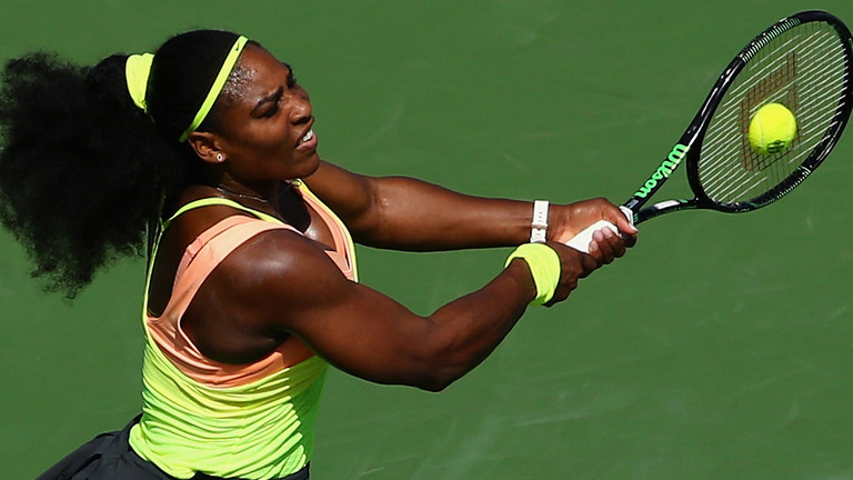 Williams returns a backhand against Ana Ivanovic