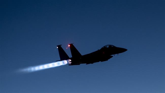 Air Force F-15E Strike Eagle flying over northern Iraq after conducting airstrikes in Syria