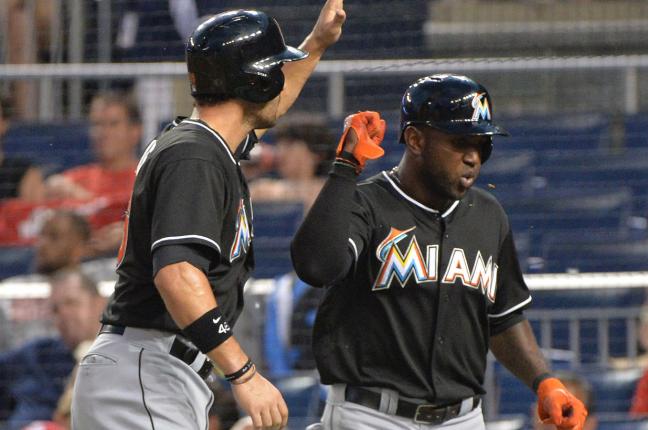 Ozuna, Prado power Marlins to 9-7 win over Phillies