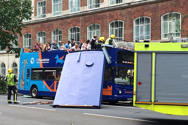 A double decker bus that had its roof ripped off when it crashed into a tree in Woburn Place Bloomsbury central London. Taken with permission from the Twitter feed @chromanris