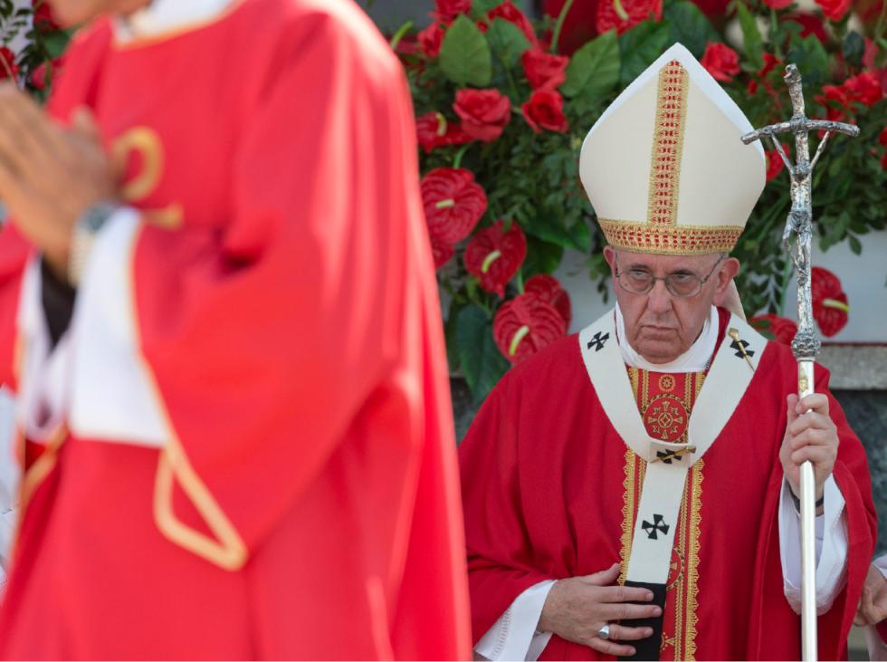 Pope Francis approaches the altar with his pastoral staff to celebrate Mass at the Plaza of the Revolution in Holguin Cuba Monday Sept. 21 2015. Speaking in his homily Francis called on Cubans to heed Jesus Christ's invitation to overcome resistance