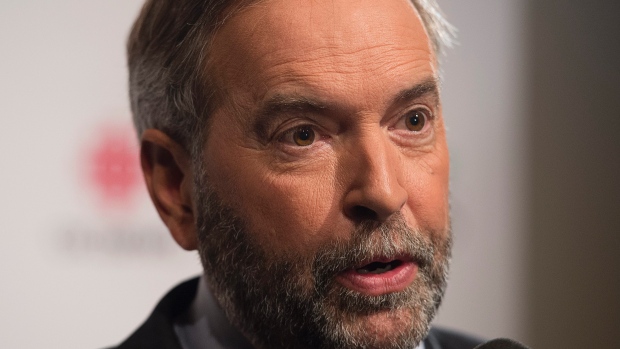 NDP Leader Tom Mulcair says 'We have very smart experienced people around us who are looking at the shape of things to come as we wait for our result.&#39