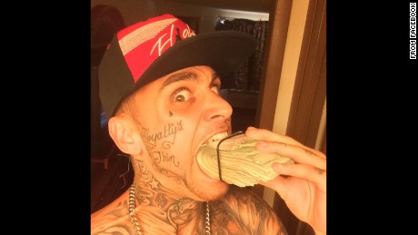 Bank Robber Caught After Posting Pictures On Facebook With Stolen Cash (PICTURES)