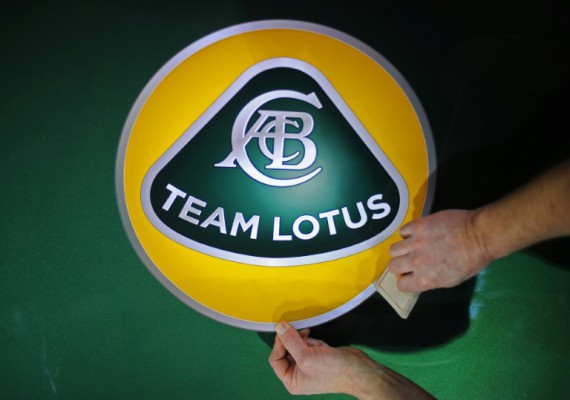 AFP  File  Carl de SouzaA man prepares panel boards with the new F1 Team Lotus logo at their headquarters in Hingham Norfolk eastern England