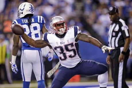 New England Patriots running back Jonas Gray celebrates after scoring a touchdown against the Indianapolis Colts during the first half of an NFL football game in Indianapolis Sunday Nov. 16 2014