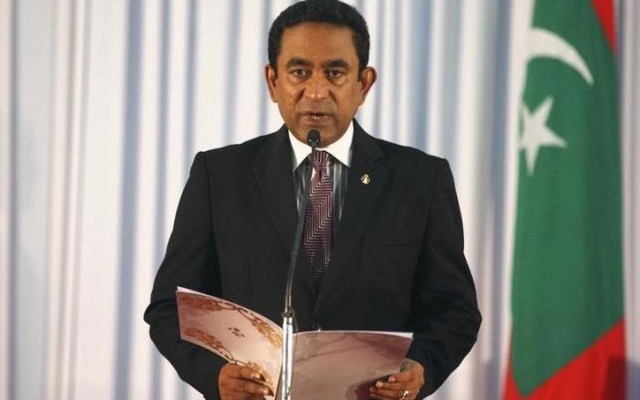 Abdulla Yameen takes his oath as the President of Maldives during a swearing-in ceremony at the parliament in Male