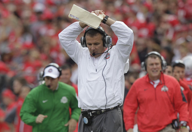 Ohio State head coach Urban Meyer reacts to missing a fourth down conversion against Northern Illinois during the second quarter of an NCAA college football game Saturday Sept. 19 2015 in Columbus Ohio. Ohio State won 20-13