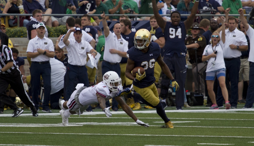 Junior cornerback Cole Luke looks upfield after his interception in Notre Dame’s 62-27 win Saturday