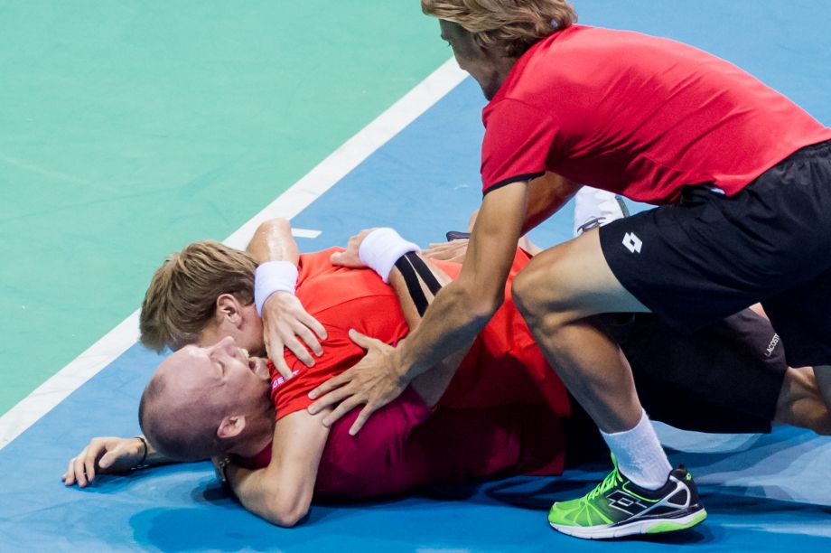 Belgium's Steve Darcis celebrates after winning against Argentina's Federico Delbonis during the last singles match at the Davis Cup World Group semifinals between Belgium and Argentina in Brussels Sunday Sept. 20 2015. Belgium qualifies for the Davis