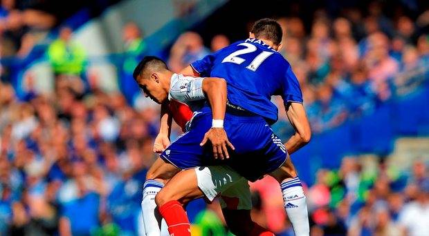 Arsenal's Alexis Sanchez and Chelsea's Nemanja Matic battle for the ball