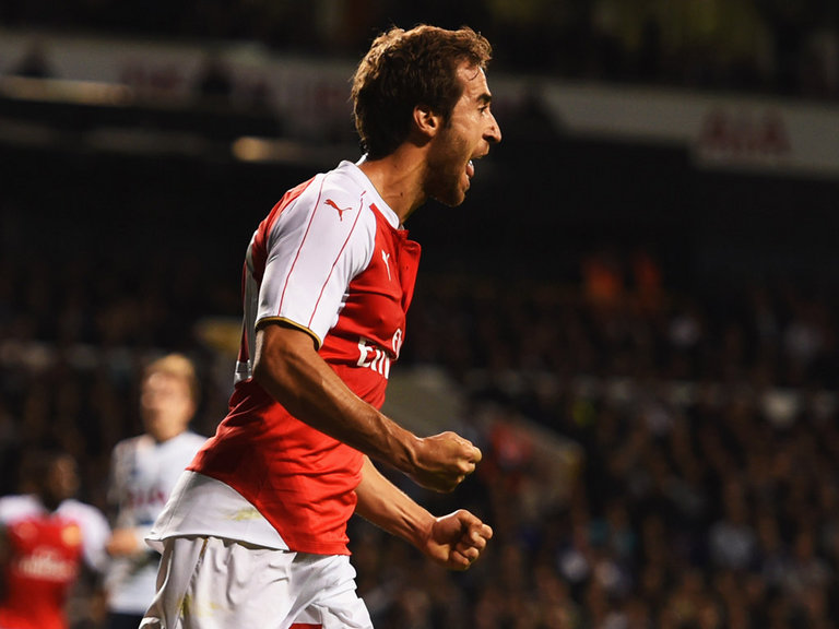 Mathieu Flamini of Arsenal celebrates as he scores their first goal