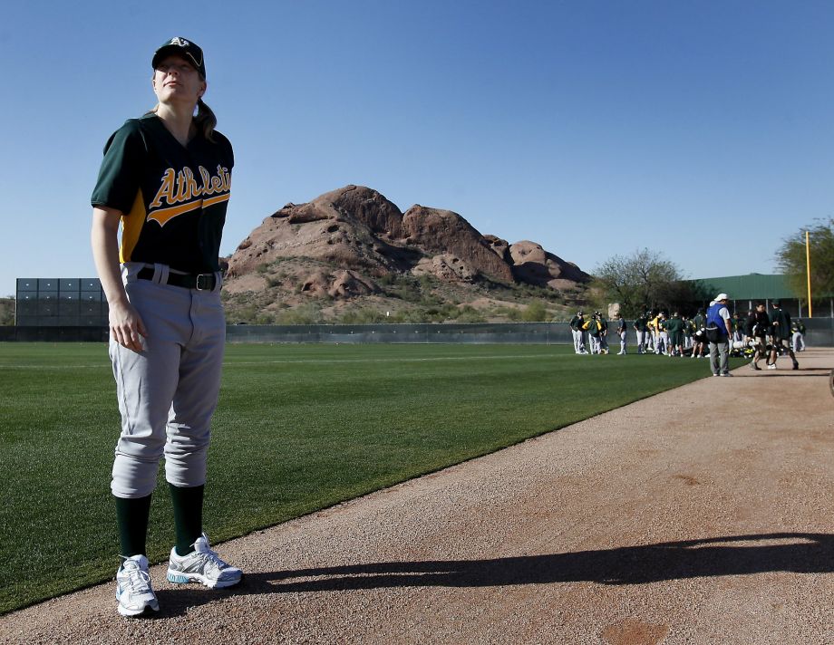 Justine Siegal waits for her chance to pitch batting practice to the Oakland A's in 2011