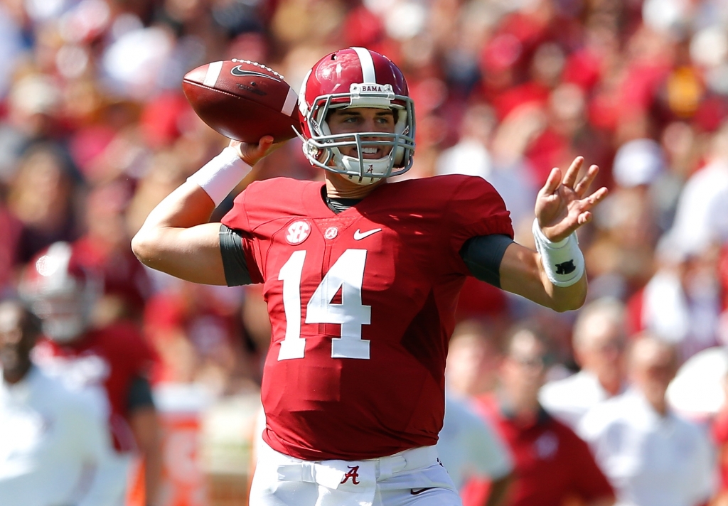 TUSCALOOSA AL- SEPTEMBER 12 Jake Coker #14 of the Alabama Crimson Tide looks to pass against the Middle Tennessee Blue Raiders at Bryant Denny Stadium