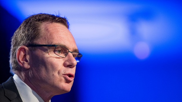 BHP Billiton chief Andrew Mackenzie saw his pay packet shrink last year