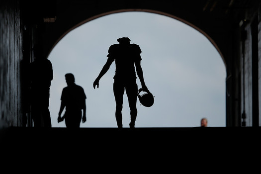 BYU players head into tunnel after losing 31-0 at the Michigan Wolverines