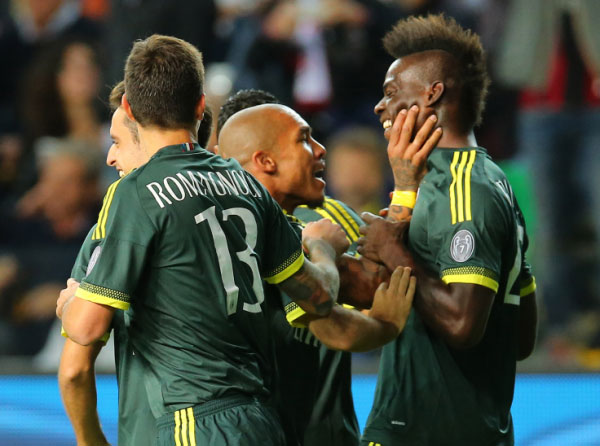 AC Milan's Mario Balotelli right celebrates with his Dutch teammate Nigel Dejong after scoring during the Serie A soccer match between Udinese and AC Milan at the Friuli Stadium in Udine Italy Tuesday Sept. 22 2015