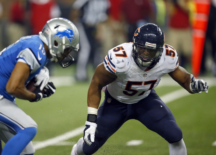 Chicago Bears inside linebacker Jon Bostic sets to tackle Detroit Lions wide receiver Golden Tate during an NFL football game on Thursday Nov. 27 2014 in Detroit. The Lions won the game 34-17