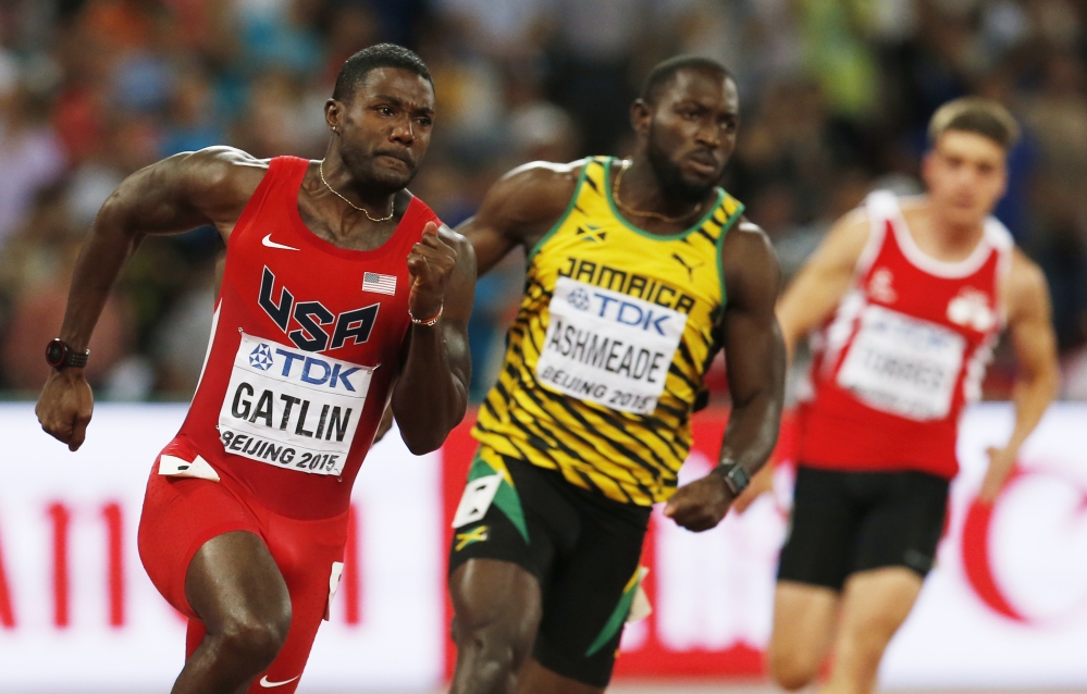 Justin Gatlin left races in a round one heat alongside Nickel Ashmeade of the men’s 200m at the World Athletics Championships on Tuesday at the Bird’s Nest stadium in Beijing