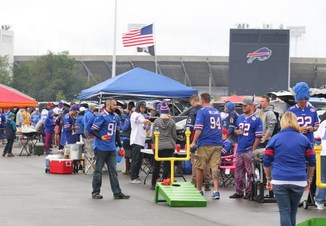 Fans tailgate outside Ralph Wilson Stadium before the Bills&#39 win over the Colts