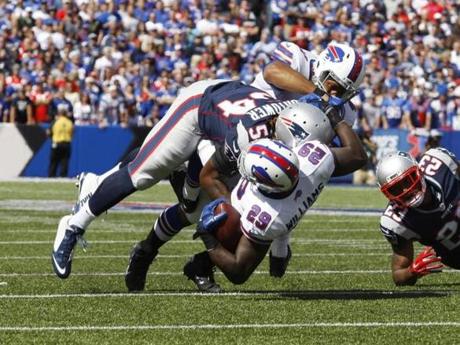 There were heavy hits delivered on Sunday including this stop of Bills running back Karlos Williams by Patriots linebacker Dont’a Hightower