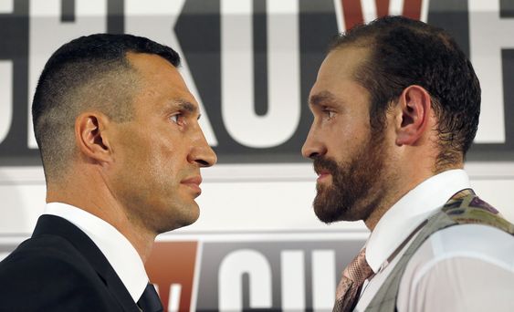 Tyson Fury dresses as BATMAN for press conference with Wladimir Klitschko