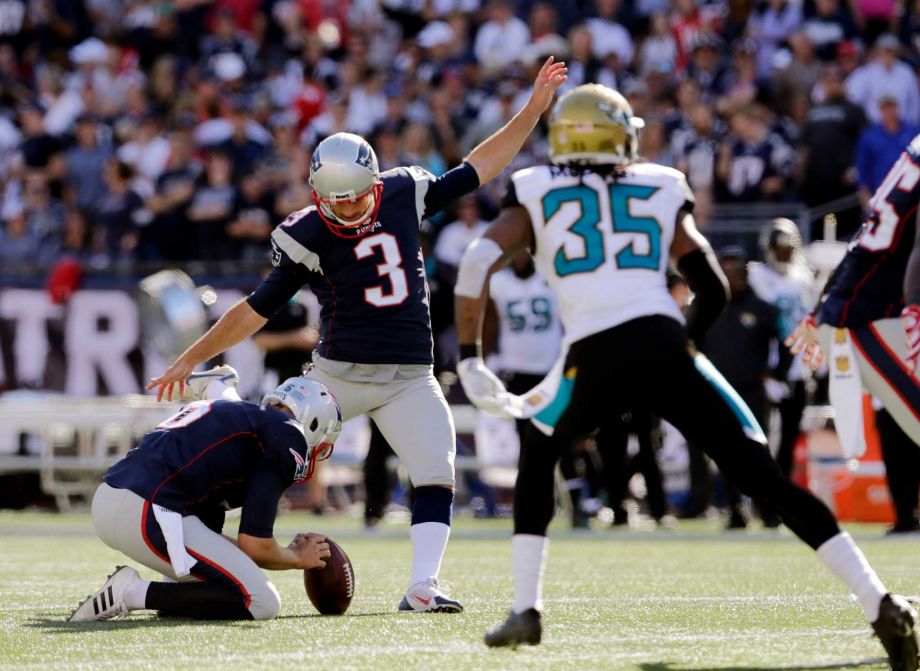 New England Patriots kicker Stephen Gostkowski kicks his 423rd consecutive point after touchdown to set a new NFL record in the second half of an NFL football game against the Jacksonville Jaguars Sunday Sept. 27 2015 in Foxborough Mass