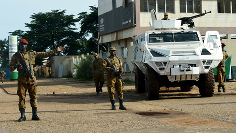 Burkina Faso army troops stand guard in Ouagadougou on Sept. 22