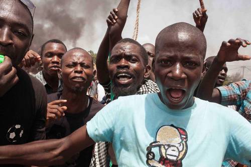 Burkina Faso citizens demonstrating against military coup in 2015
Time