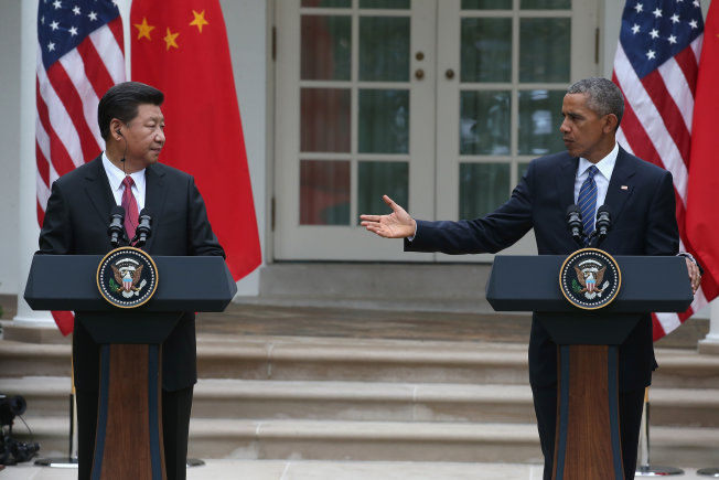 President Barack Obama speaks next to Chinese President Xi Jinping at a joint press conference in the Rose Garden at The White House in Washington DC on 25 September 2015