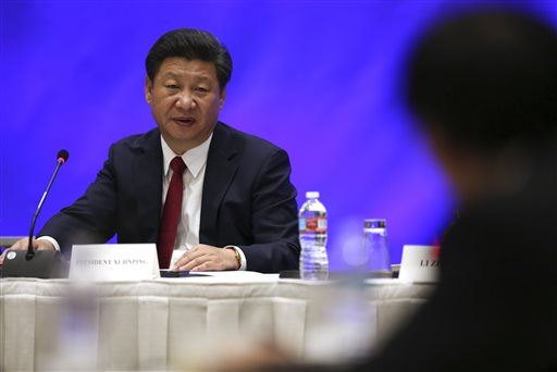 Chinese President Xi Jinping speaks prior to a forum with several Chinese leaders and Governors from the U.S. in Seattle Tuesday Sept. 22 2015. Leaders from Michigan to Beijing attended meetings Tuesday with Xi in the U.S. and signed an agreement aimed