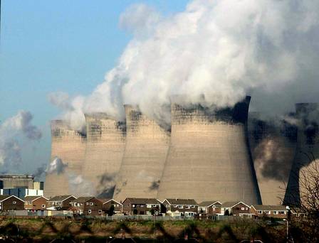 Cooling towers for a coal fired power station as analysis suggests that UK councils have invested £14 billion of pension funds in fossil fuels an average of £218 per resident across the country