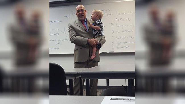 Professor holds child for single mom during class