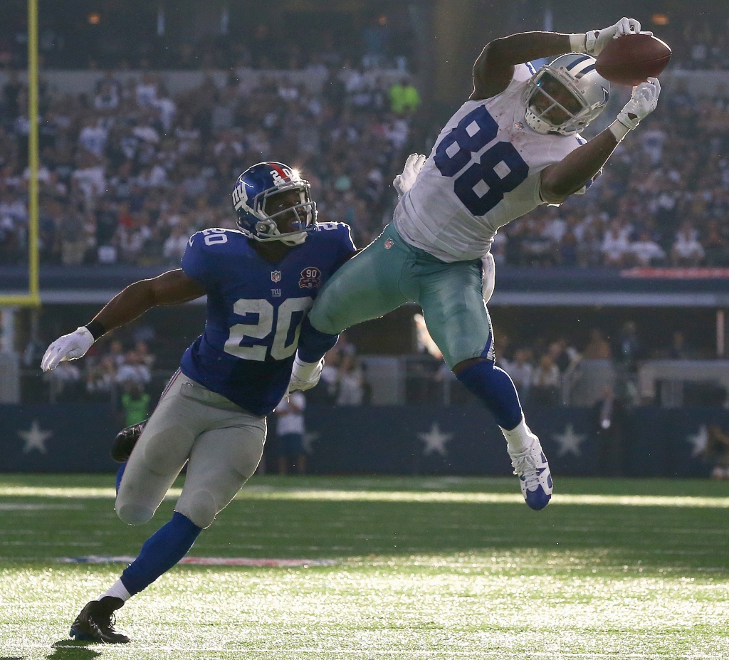 Dez Bryant makes a catch over Prince Amukamara last