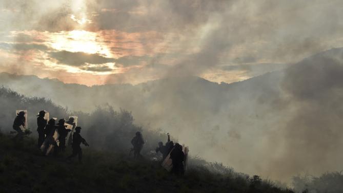 Mexico police, protesters clash in 43 missing case