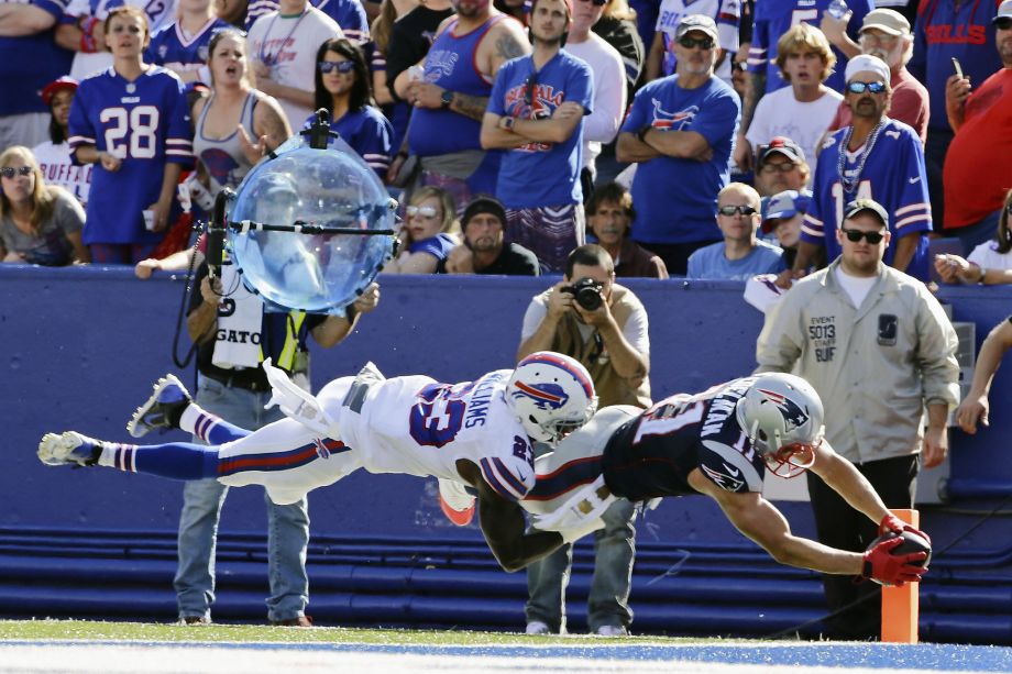 Buffalo Bills free safety Aaron Williams tackles New England Patriots wide receiver Julian Edelman in the end zone during the second half of an NFL football game Sunday Sept. 20 2015 in Orchard Park N.Y. Williams was injured on the play as E