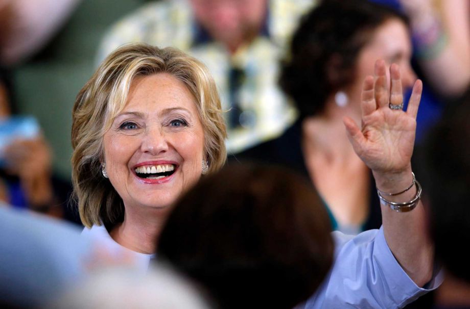 Democratic presidential candidate Hillary Rodham Clinton acknowledges applause at a campaign organizing meeting Friday Sept. 18 2015 in Portland Maine