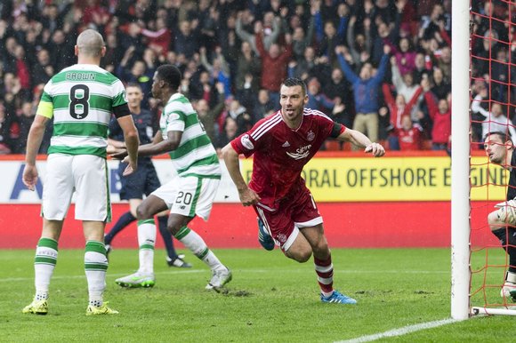 Sweet revenge Paul Quinn scores the winning goal for Aberdeen against Celtic