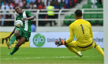 Dream Team V1 striker trying to bend the ball beyond a keeper in one of their qualifying matches for AAG