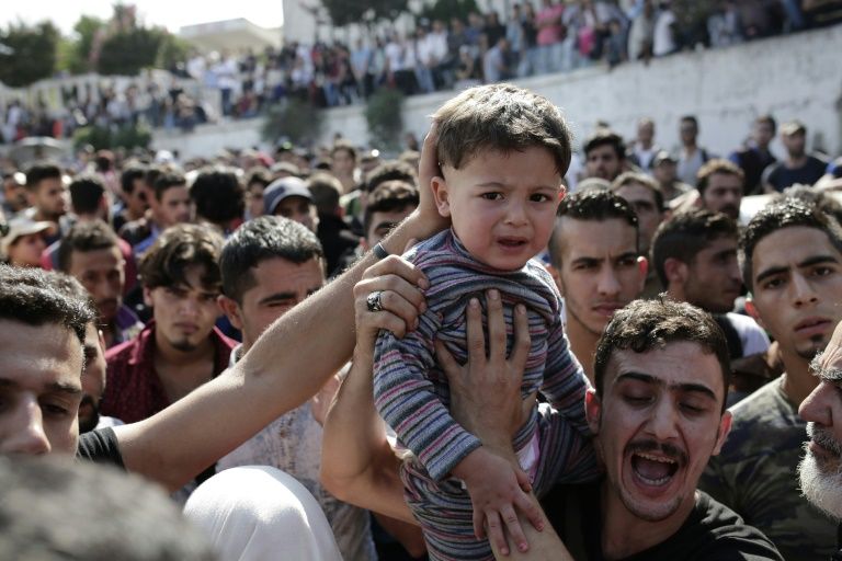 EU parliament backs refugee relocation plan