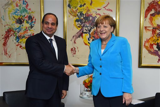 25 2015 provided by the office of the Egyptian Presidency Egyptian President Abdel Fattah el-Sissi left shakes hands with German Chancellor Angela Merkel during the meetings of the UN General Assembly in New York