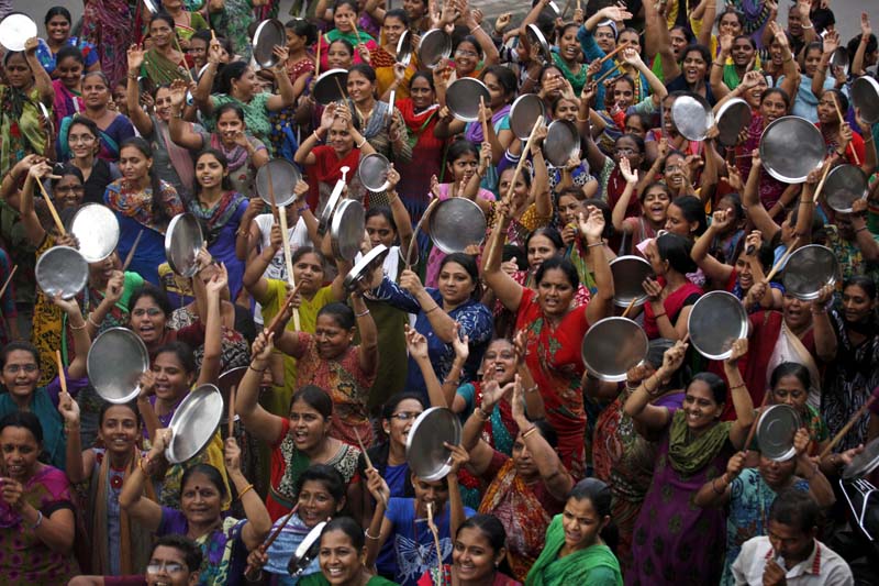 Patidar also known as the Patel community for the last name they share women beat plates with wooden sticks during a protest after Hardik Patel a firebrand leader of Patidar Andolan Samiti was detained by the Indian police in Surat in Ahmadabad India